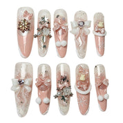 Blush Snow Bows pink winter press-on nails with 3D bows, snowflakes and pearls by Poppy Nails
