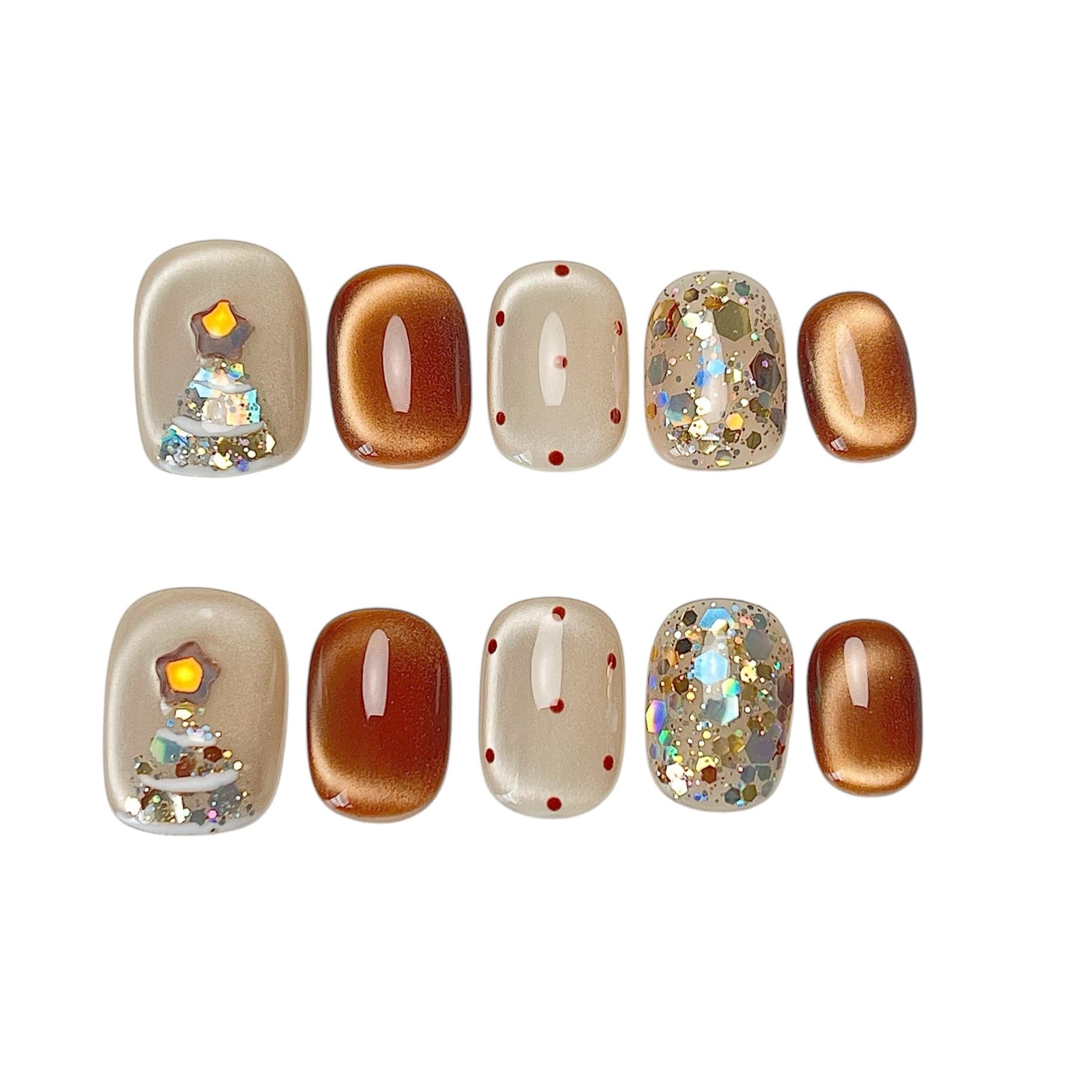 Cocoa & Twinkle short oval press-on nail set featuring metallic cocoa brown, creamy ivory, red polka dots, a sparkling Christmas tree design, and iridescent silver glitter accents.