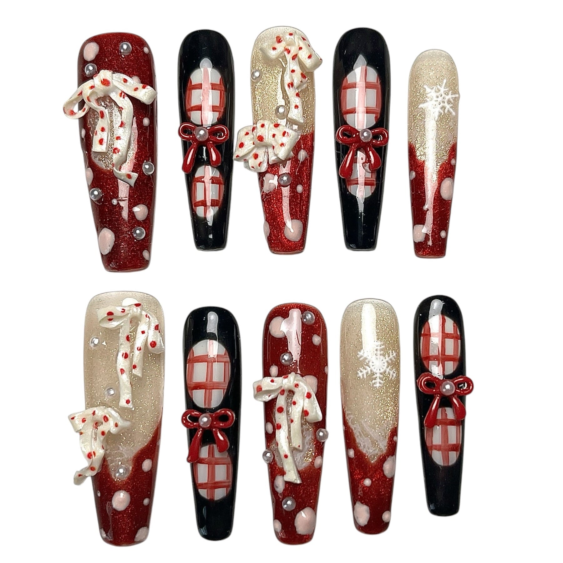 Midnight Candy Bows long coffin Christmas press-on nail set featuring glossy black, glittery red, 3D candy cane charms, red ribbon bows, plaid patterns and snowflake accents.