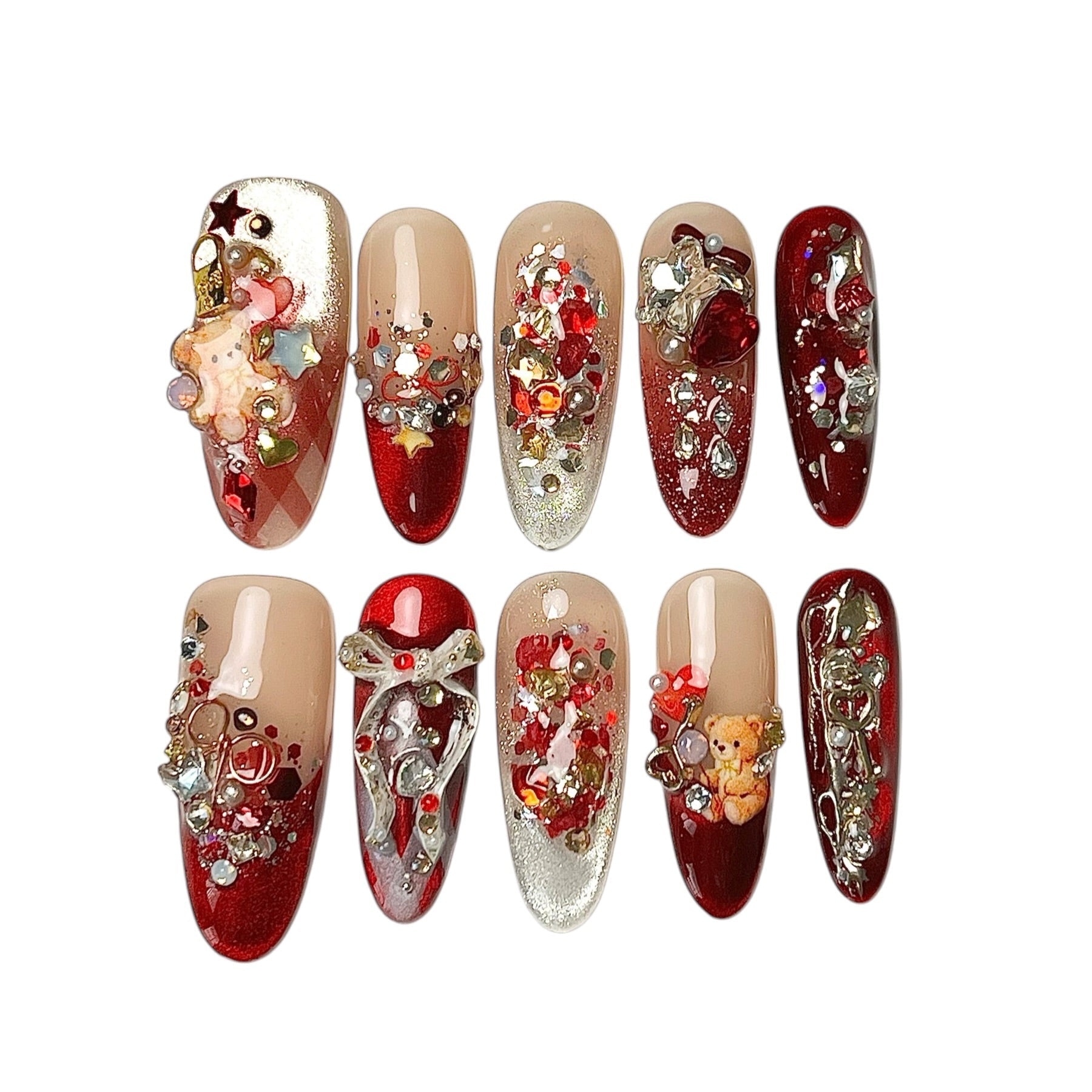 Ruby Teddy Treasures long coffin press-on nail set in ruby red, champagne gold and nude, featuring 3D teddy bear charms, metallic bows, hearts, pearls and sparkling crystals.